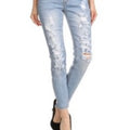 Distressed light denim pants